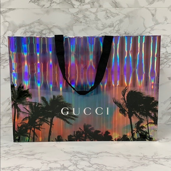 gucci holographic bag